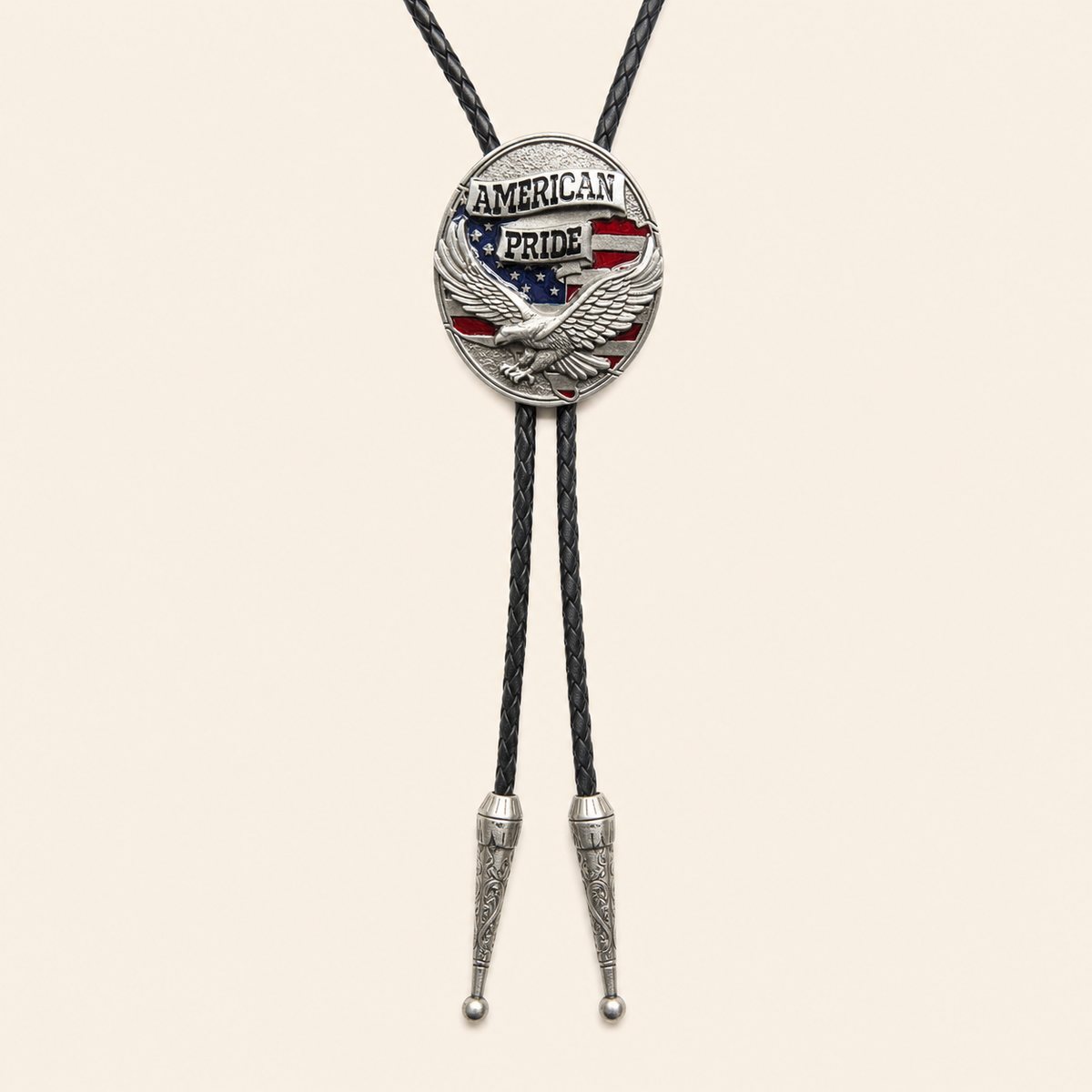 American Pride eagle flag bolo tie with antique silver medallion on warm ivory background