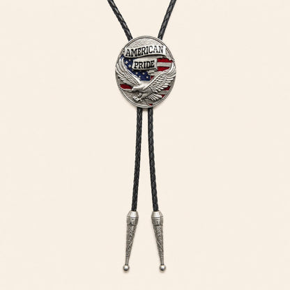 American Pride eagle flag bolo tie with antique silver medallion on warm ivory background