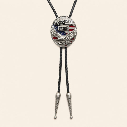 American Pride eagle flag bolo tie with antique silver medallion on warm ivory background