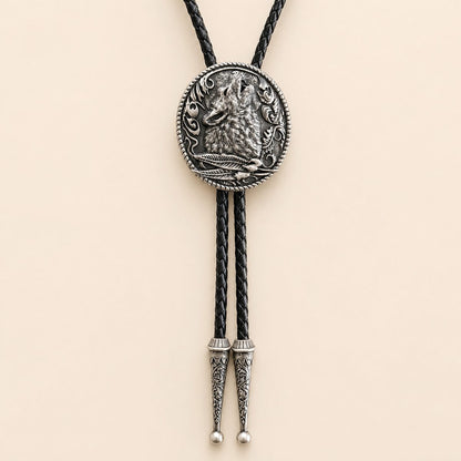 Moonlit Howling Wolf Silver Bolo Tie on warm ivory background