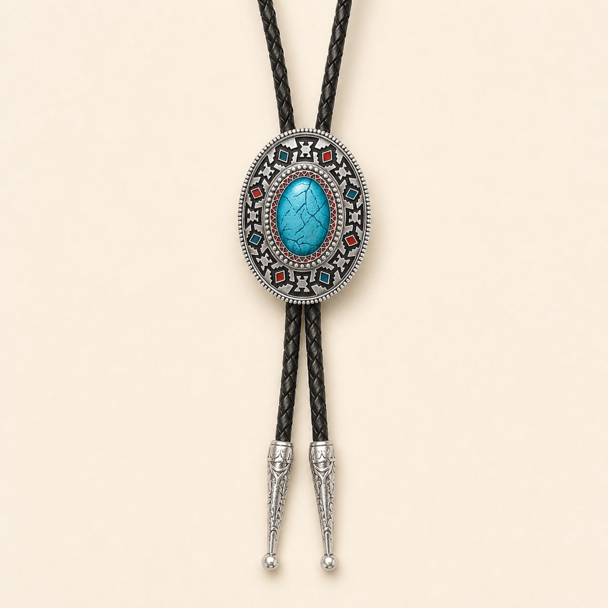 Southwestern enamel bolo tie with blue and red geometric concho on a warm ivory background