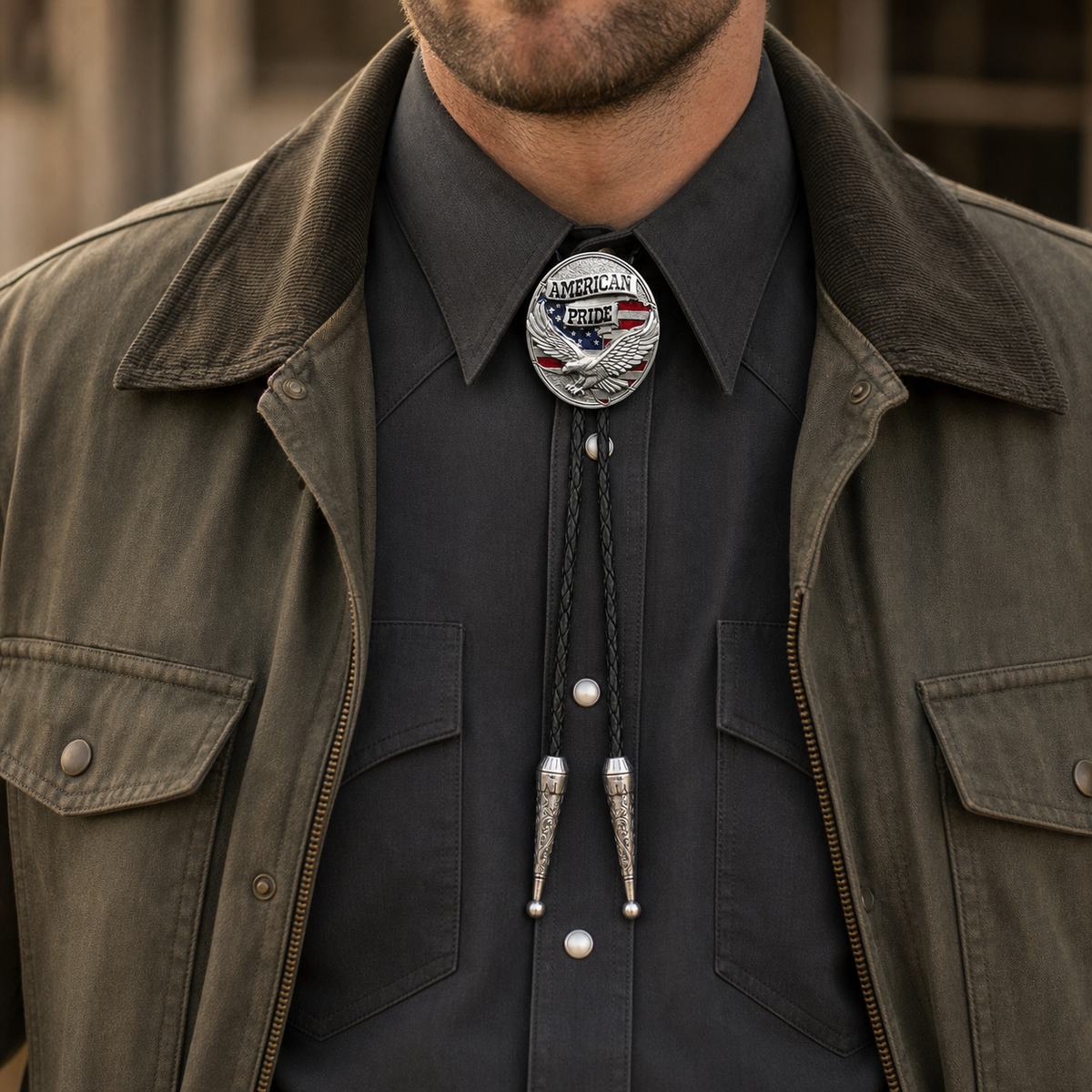 American Pride eagle flag bolo tie styled with a charcoal Western shirt and olive ranch jacket