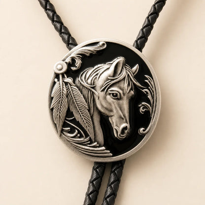 Close-up of black enamel horse head bolo tie medallion