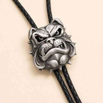 Close-up of antique silver English bulldog bolo tie with sculpted spiked collar detail