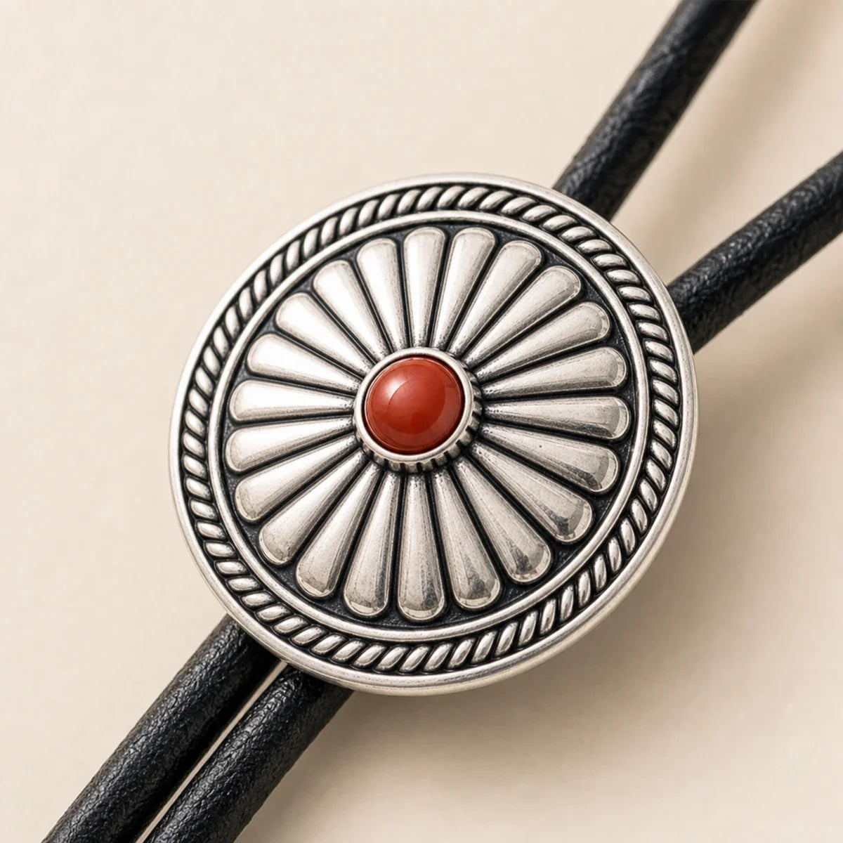 Close-up of S925 silver daisy medallion with natural red agate center stone
