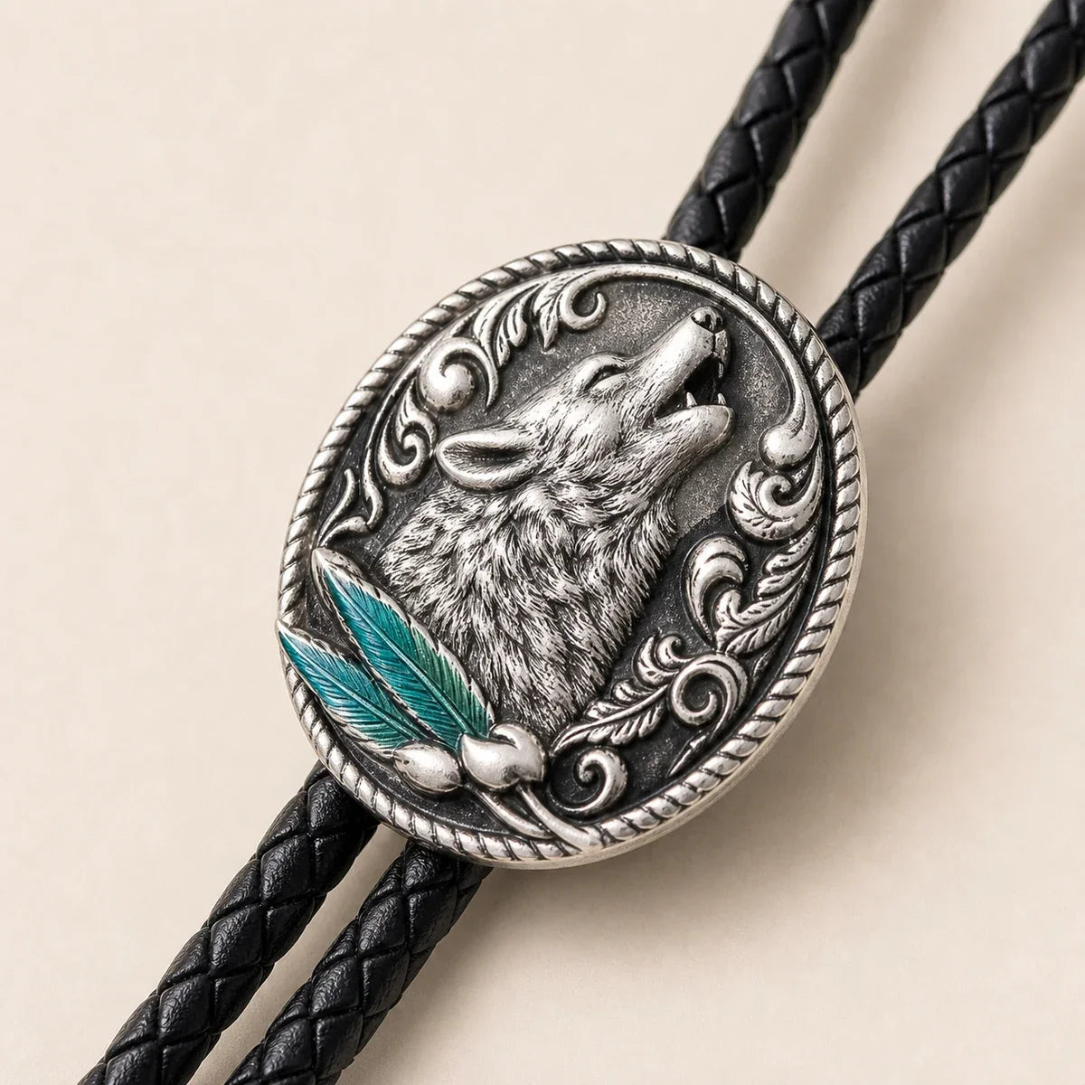 Close-up of antique silver-tone wolf totem medallion with cold enamel detail