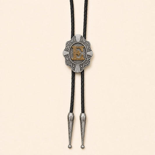 Gold letter E Western bolo tie on warm ivory background