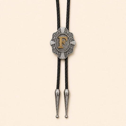 Gold letter F Western bolo tie on warm ivory background