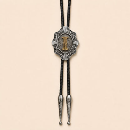 Gold letter I Western bolo tie on warm ivory background
