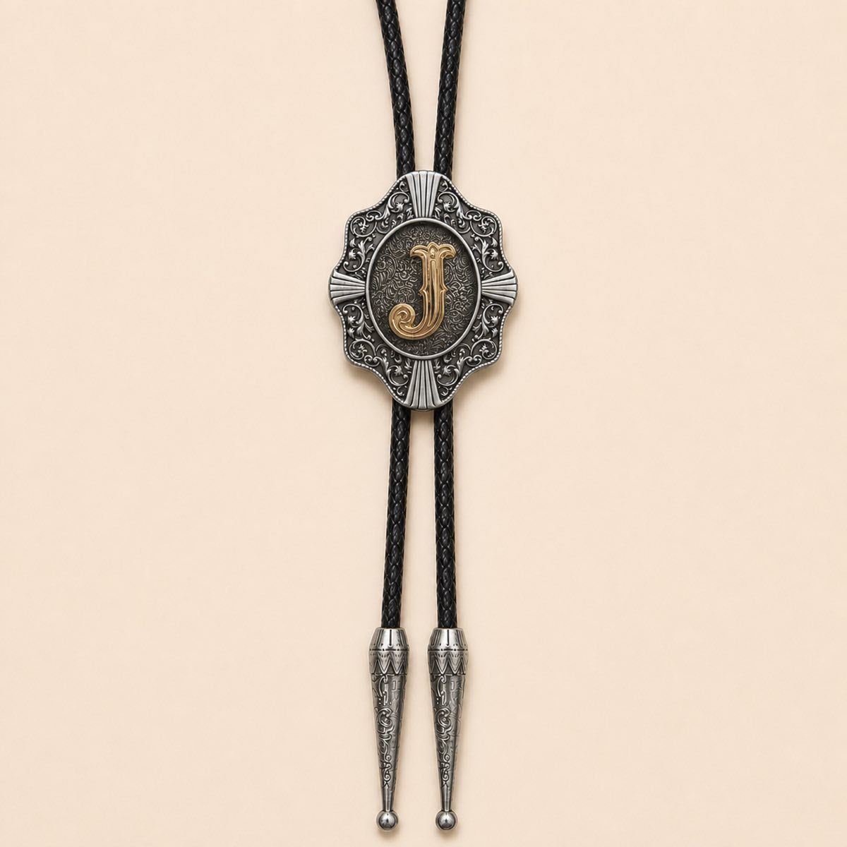 Gold letter J Western bolo tie full product on warm ivory background
