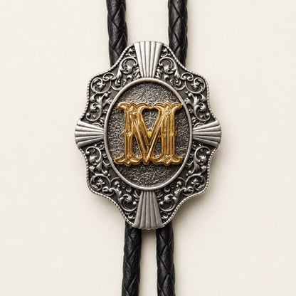 Gold letter M bolo tie engraved metal detail