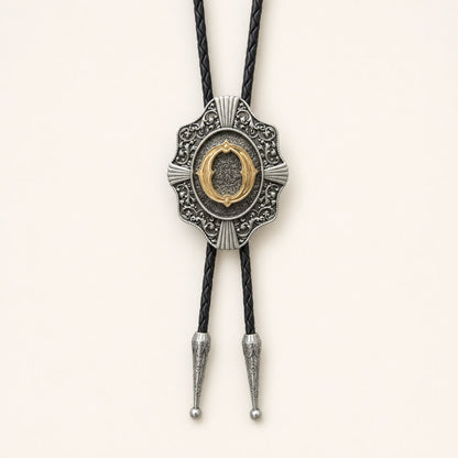 Gold letter O western bolo tie on ivory background
