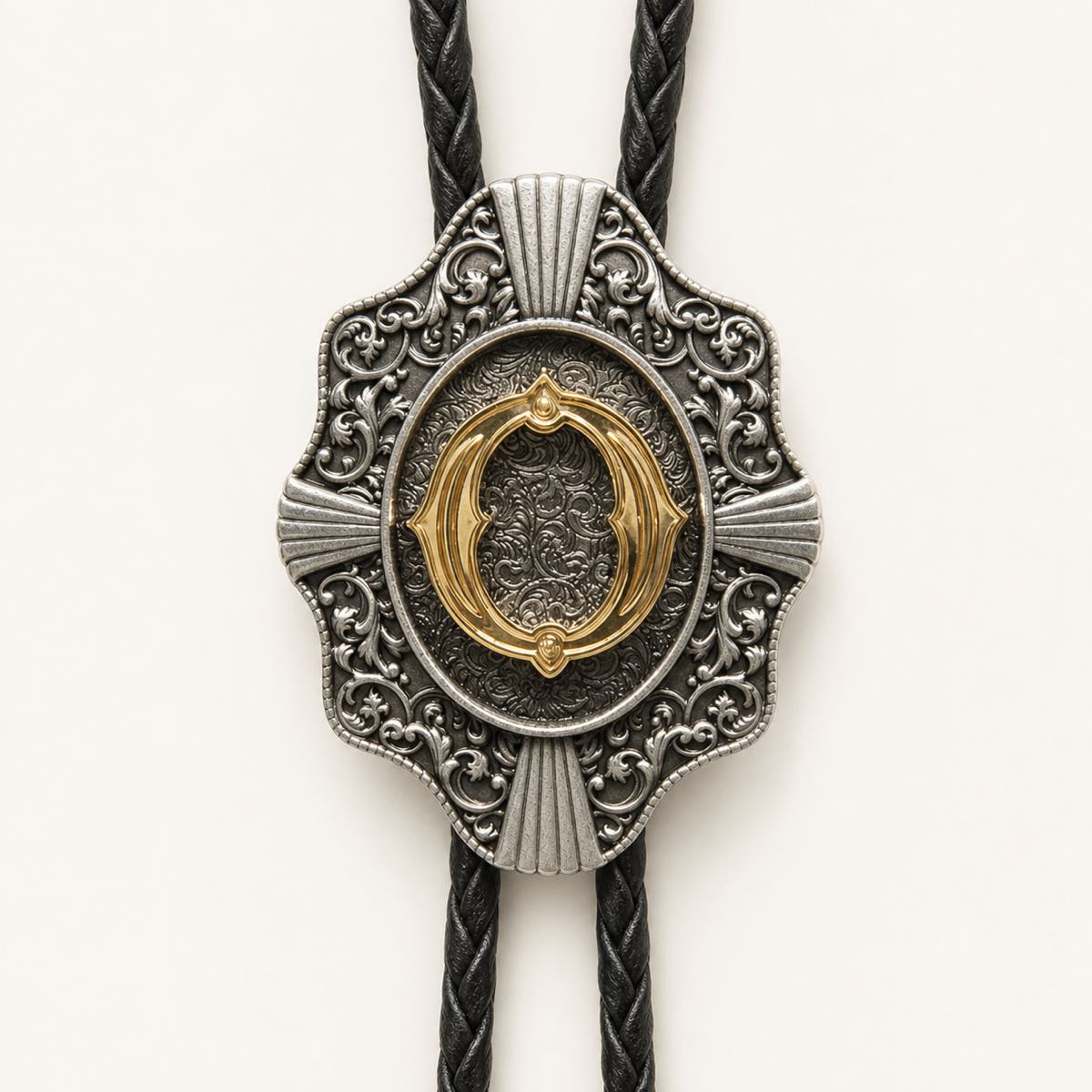 Gold letter O bolo tie engraved metal detail