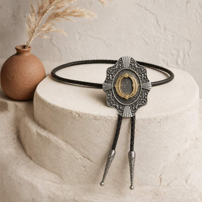 Gold letter O bolo tie in a Southwestern boutique display