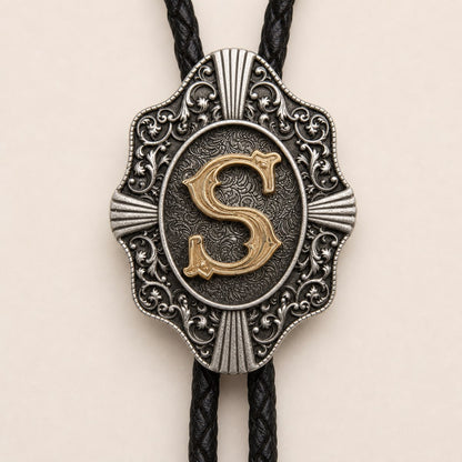 Gold letter S bolo tie engraved metal craftsmanship detail