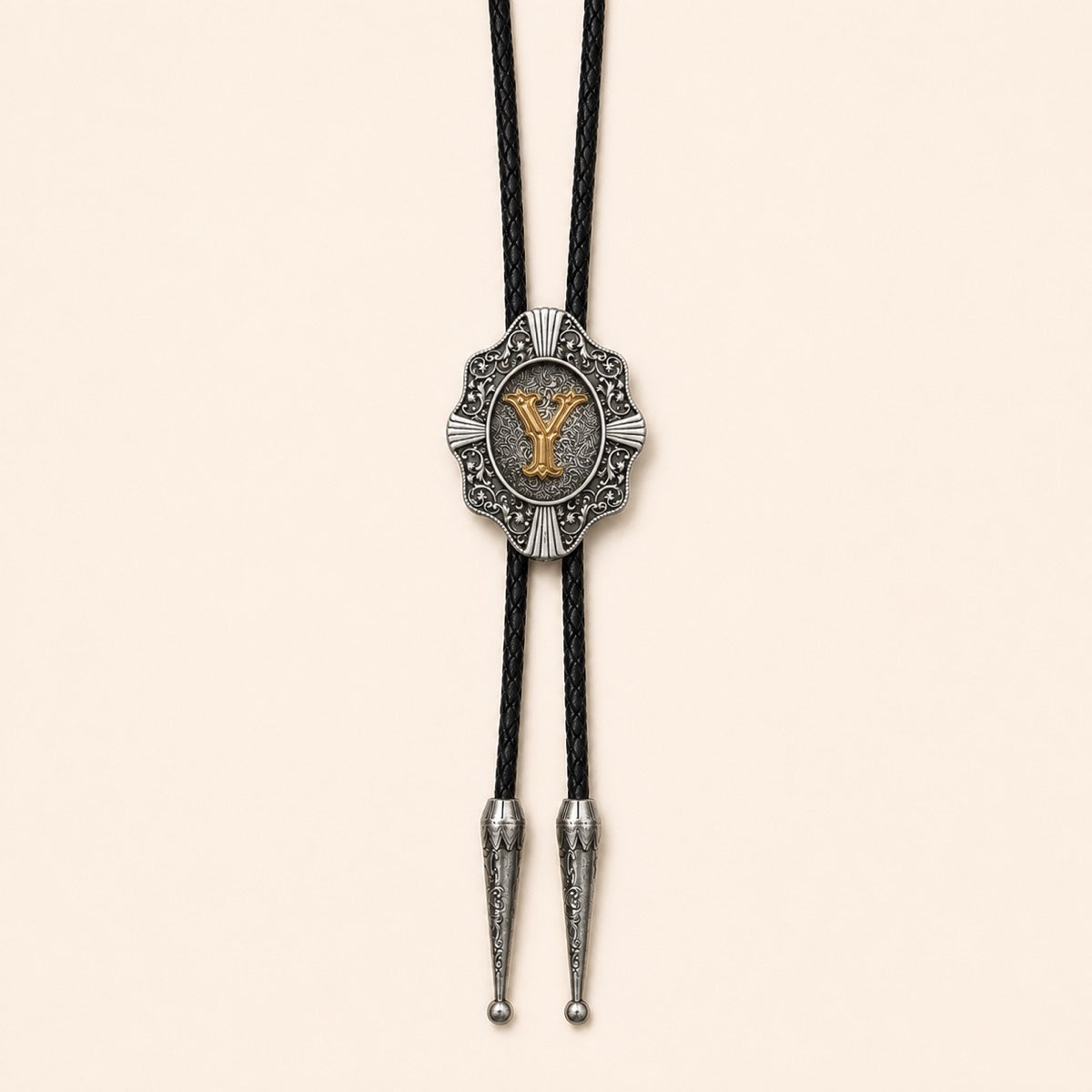 Gold letter Y western bolo tie on pale warm ivory background